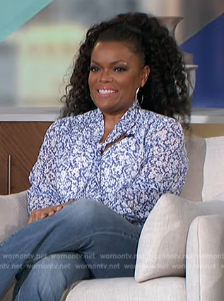 Yvette Nicole Brown’s blue floral print tie neck blouse on The Talk