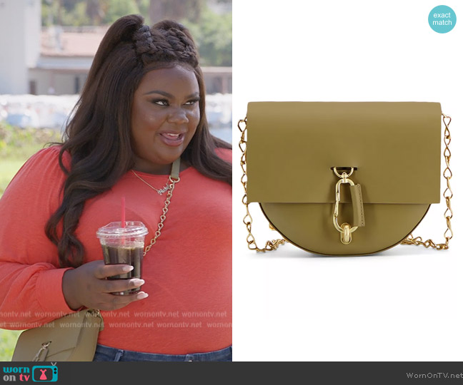 Zac Posen Belay Mini Saddle Crossbody worn by Nicky (Nicole Byer) on Grand Crew