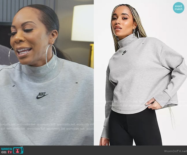 Nike Tech Fleece turtleneck sweatshirt in gray heather worn by Sanya Richards-Ross on The Real Housewives of Atlanta