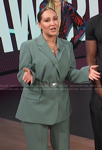 Adrienne’s green chain belt blazer on E! News