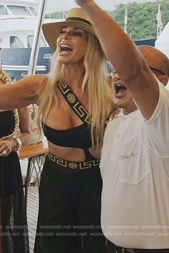 Alexia’s logo trim top and pleated pants on The Real Housewives Ultimate Girls Trip