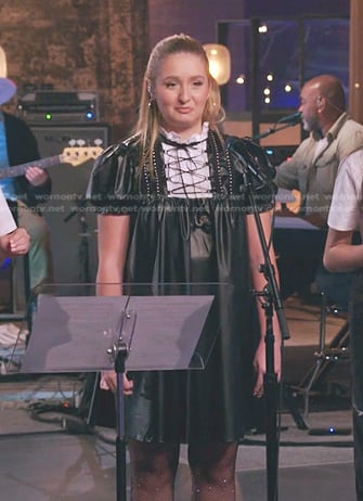 Ana Heichel’s black puff sleeve leather mini dress on The Voice