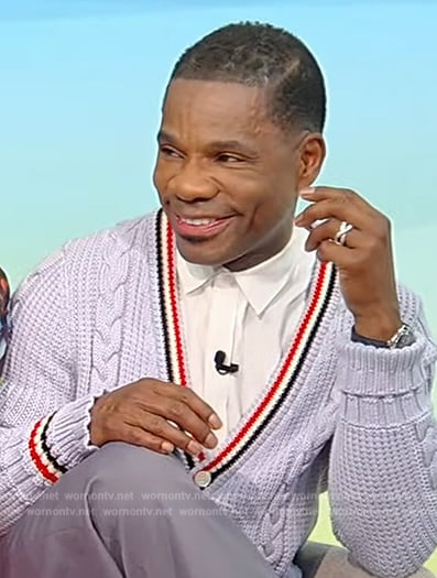 Kirk Franklin’s blue cable knit stripe trim cardigan on Tamron Hall Show