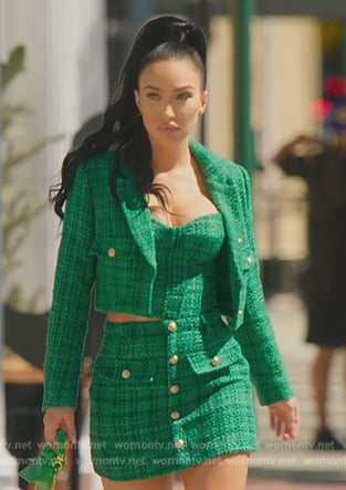 Bre’s green tweed jacket and mini skirt on Selling Sunset