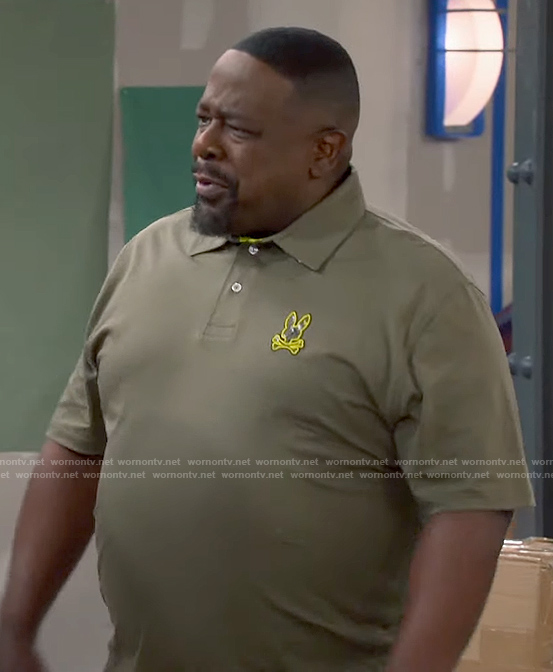 Calvin’s olive green crossbones polo shirt on The Neighborhood