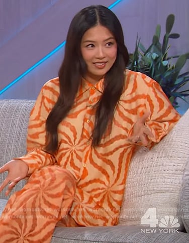 Christine Ko’s orange printed shirt and pants on The Kelly Clarkson Show