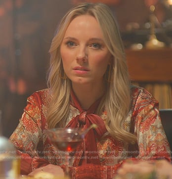 Clair’s red printed tie neck dress on Good Trouble