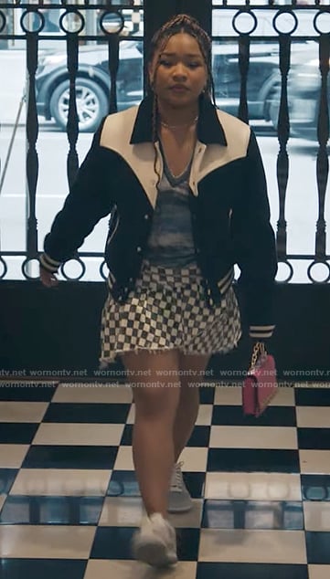 Delilah’s checkerboard skirt and two-tone bomber jacket on The Equalizer