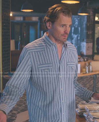 Denise’s blue striped shirt on Good Trouble