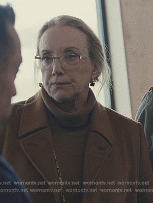 Gerri’s brown suede coat