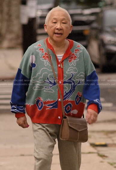 Grandma’s graphic print cardigan on Awkwafina is Nora From Queens