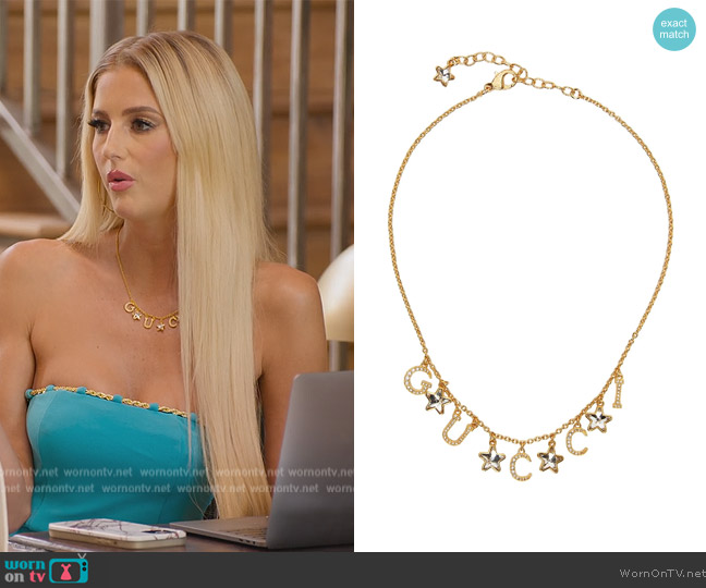 Gucci Gold Script Charm Necklace worn by Emma Hernan on Selling Sunset