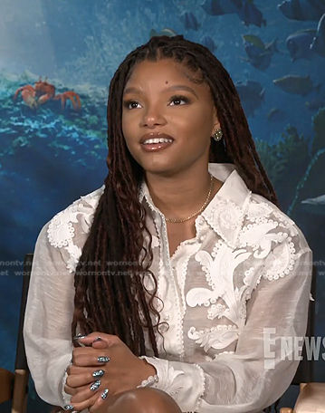 Halle Bailey’s white embroidered sheer blouse on E! News
