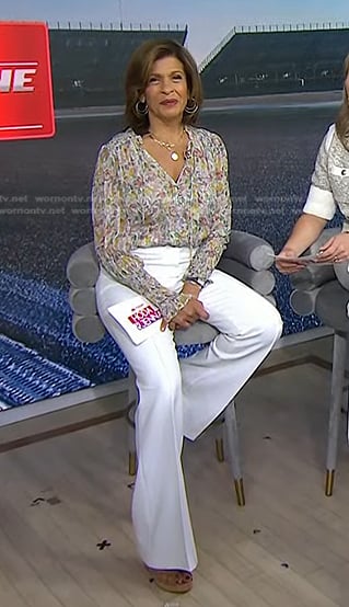 Hoda’s floral blouse and white flare pants on Today