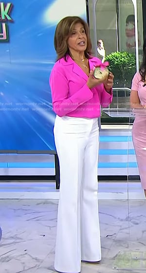 Hoda’s pink shirt and white flare pants on Today