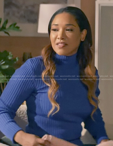 Iris’s blue sweater with shoulder cutout on The Flash