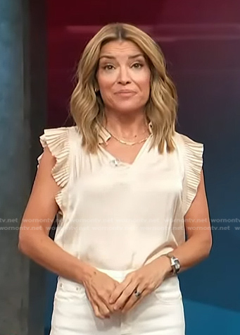 Kit’s champagne pleated top on Access Hollywood