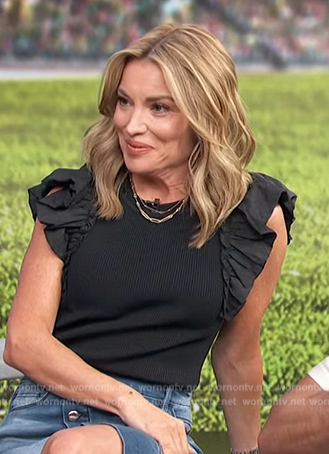 Kit’s black ruffled top on Access Hollywood