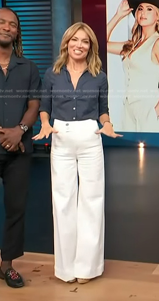 Kit’s navy ruched sleeve shirt and white pants on Access Hollywood
