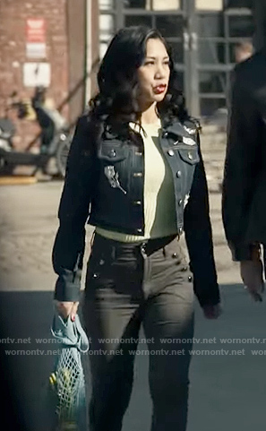 Mel’s lime sweater and floral embroidered denim jacket on The Equalizer
