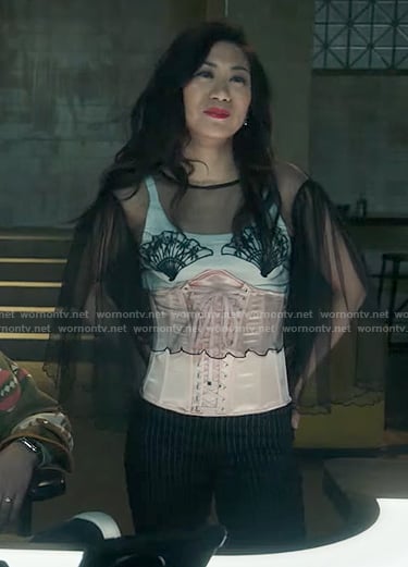 Mel’s pink corset on The Equalizer