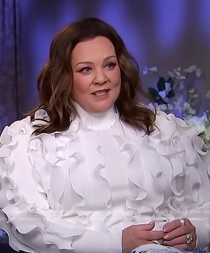 Melissa McCarthy’s white ruffle top on Access Hollywood