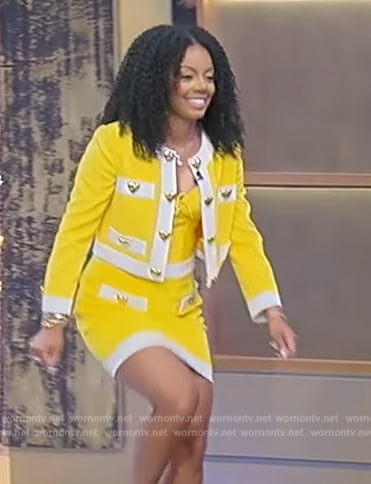 Monique Rodriguez’s yellow heart detail jacket and skirt on Tamron Hall Show