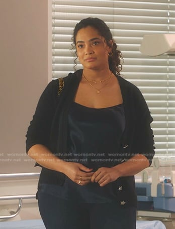Natalia’s black star button cardigan on 9-1-1
