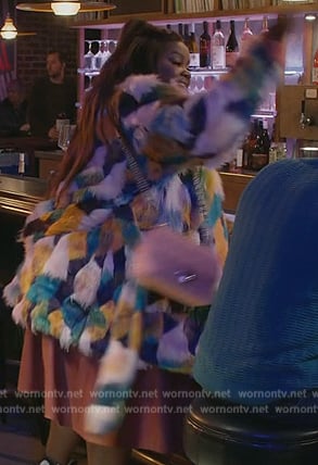 Nicky’s faux fur coat on Grand Crew