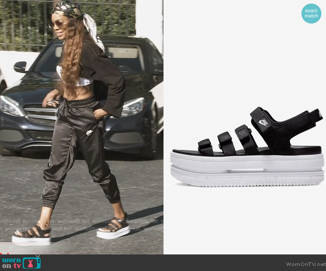 Nike Icon Classic platform sandals in black worn by Sanya Richards-Ross on The Real Housewives of Atlanta