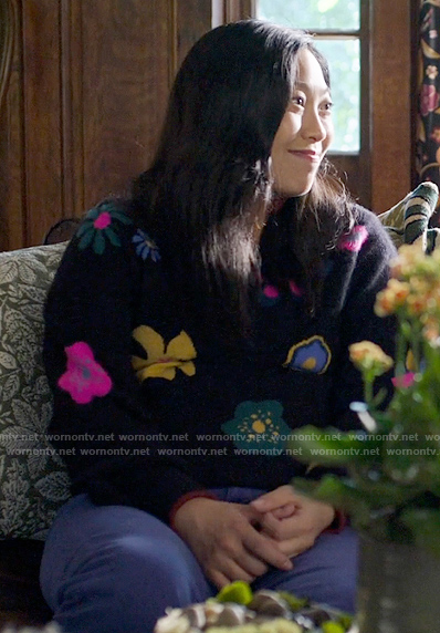 Nora’s black floral sweater on Awkwafina is Nora From Queens