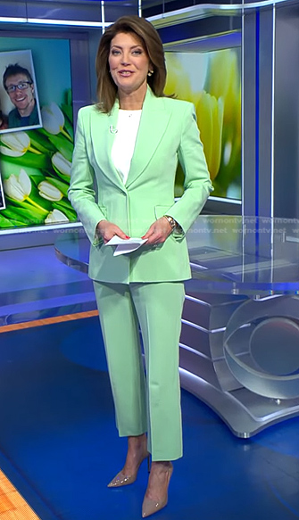 Norah’s mint green pant suit on CBS Evening News