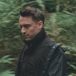 Roman’s navy rain jacket