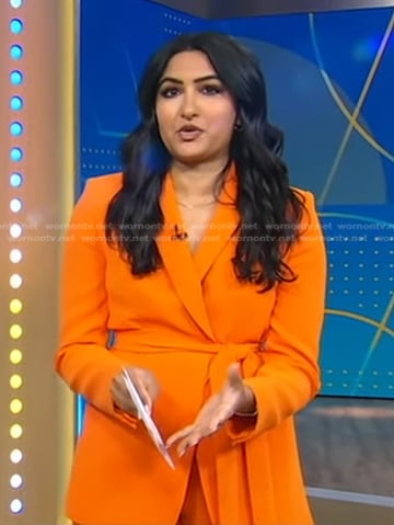 Reena’s orange wrap blazer and pants on Good Morning America