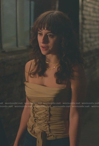 Riley’s yellow lace-up corset top on Good Trouble