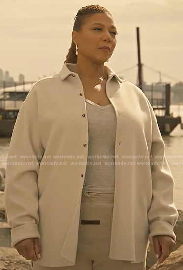 Robyn’s shirt jacket, sweatpants, and pearl hoop earrings on The Equalizer