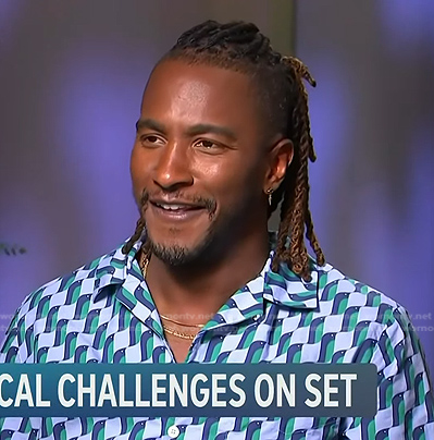Scott’s blue geometric print shirt on Access Hollywood