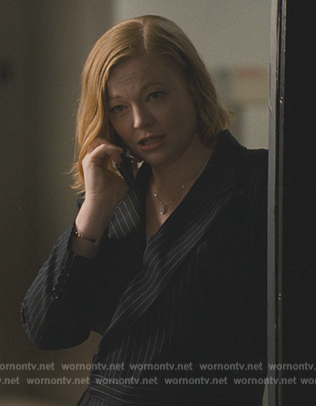 Shiv’s black pinstripe blazer jumpsuit on Succession