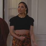 Skye’s orange abstract print pants on All American