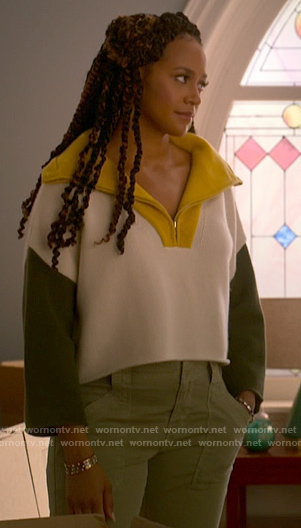 Sondi’s colorblock half-zip sweater on Run the World