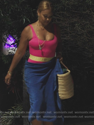 Gizelle’s pink medusa logo swimsuit on The Real Housewives Ultimate Girls Trip