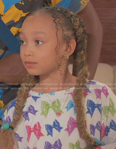 Alice’s bow print top on Ravens Home