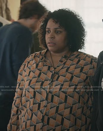 Astrid’s orange geometric print blouse on Manifest