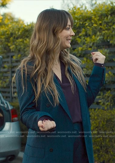 Ava’s navy striped suit on Based on a True Story