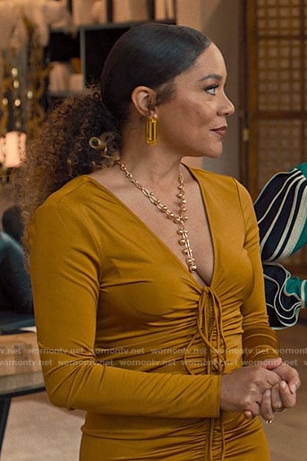 Carolyn’s gold ruched dress on Based on a True Story