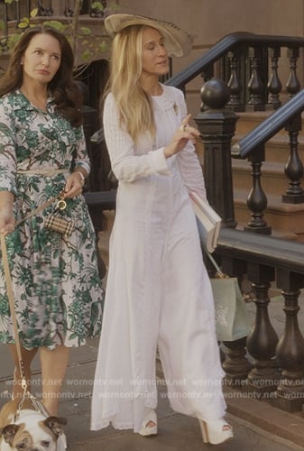 Carrie’s white lace trim jumpsuit on And Just Like That