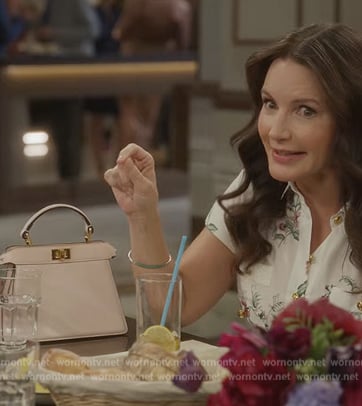 Charlotte’s pink leather shoulder bag on And Just Like That