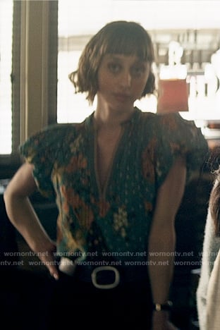 Chrissy’s green floral v-neck top on Superman and Lois