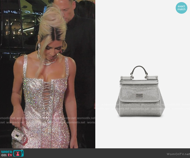 Dolce and Gabbana Mini satin Sicily bag with fusible rhinestones worn by Kim Kardashian (Kim Kardashian) on The Kardashians