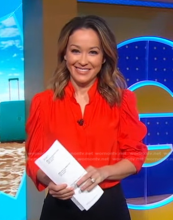 Eva’s orange ruched sleeve blouse on Good Morning America